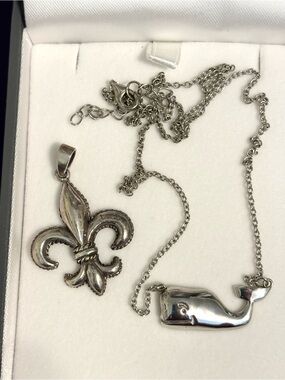 Two Sterling Silver Pendants Whale and Fluer-de-Lis.